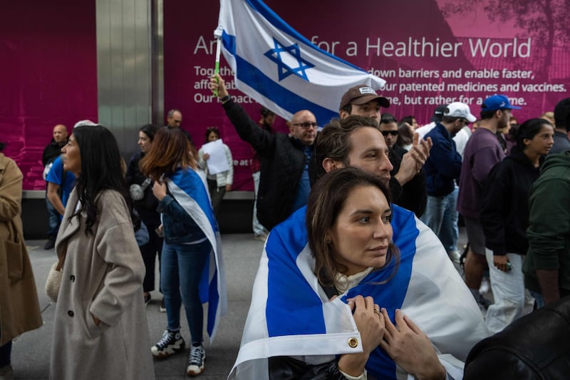 Pro-Israel supporters embrace during protests near the Israeli Consulate in New York. Getty Images