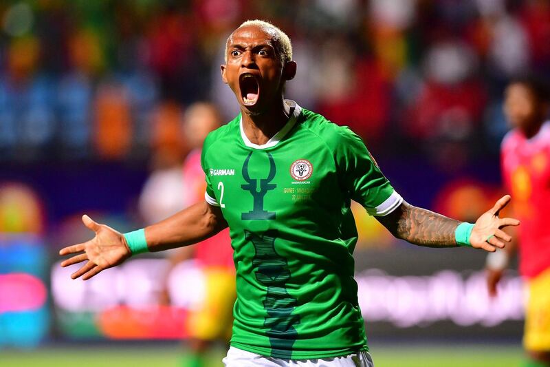 Madagascar's forward Charles Andriamahitsinoro celebrates his goal, his team's second, during the 2019 Africa Cup of Nations (CAN) football match between Guinea and Madagascar at Alexandria Stadium on June 22, 2019.  / AFP / Giuseppe CACACE
