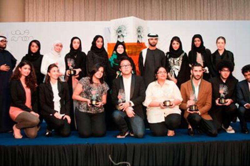 Winners and judges in the Sheikha Manal Young Artist Award are joined by HH Sheikh Mansoor bin Mohammed bin Rashid Al Maktoum and Muna Bin Kalli, executive director of Dubai Ladies Club, at the presentation ceremony at The Address, Downtown Dubai