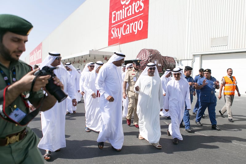 DUBAI, UNITED ARAB EMIRATES, NOVEMBER 10, 2015.  
His Highness Sheikh Ahmed bin Saeed Al Maktoum, Chairman and Chief Executive of Emirates Airline and Group, inaugurates the Emirates SkyCargoÕs cargo terminal at the Logistics District in Dubai South, and is given a tour by Nabil Sultan, left, Emirates Divisional Senior Vice President, Cargo.


Emirates SkyCentral, the cargo facility is the home of Emirates SkyCargoÕs fleet of 15 freighter aircraft, and was officially opened on the side lines of the Dubai Air Show.

Photo: Reem Mohammed/ The National (Reporter: Shereen ElGazzar / Section: BZ-News) *** Local Caption ***  RM_20151110_SKYCARGO_44.JPG