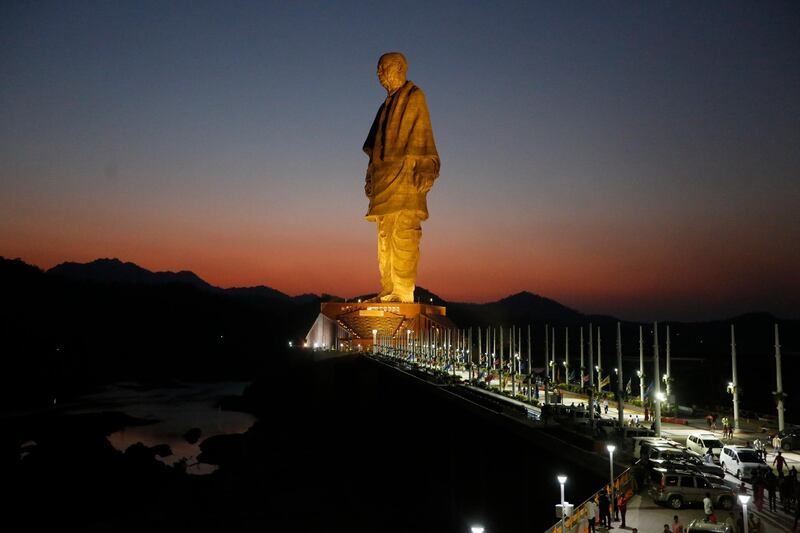 In this Wednesday, Oct. 31, 2018, file photo, the Statue of Unity is seen at dusk at Kevadiya Colony in Narmada district of Gujarat State, India. Indian Prime Minister Narendra Modi on Wednesday unveiled the towering bronze statue of Sardar Vallabhbhai Patel, a key independence leader being promoted as a national icon in the ruling party's campaign ahead of next year's general elections. (AP Photo/Ajit Solanki, File)