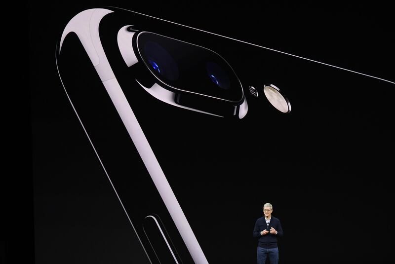 Tim Cook, chief executive officer of Apple Inc., speaks about the iPhone during an event at the Steve Jobs Theater in Cupertino, California. David Paul Morris / Bloomberg