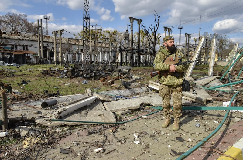 A soldier stationed in Bucha, after the city was the recaptured by the Ukrainian army. EPA