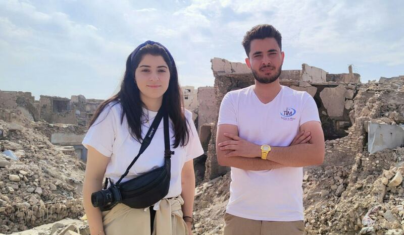 Tour guide Harith Faris, 24, right, says recent archaeological discoveries around Mosul will help make his home city a tourist attraction. Photo: Harith Faris.