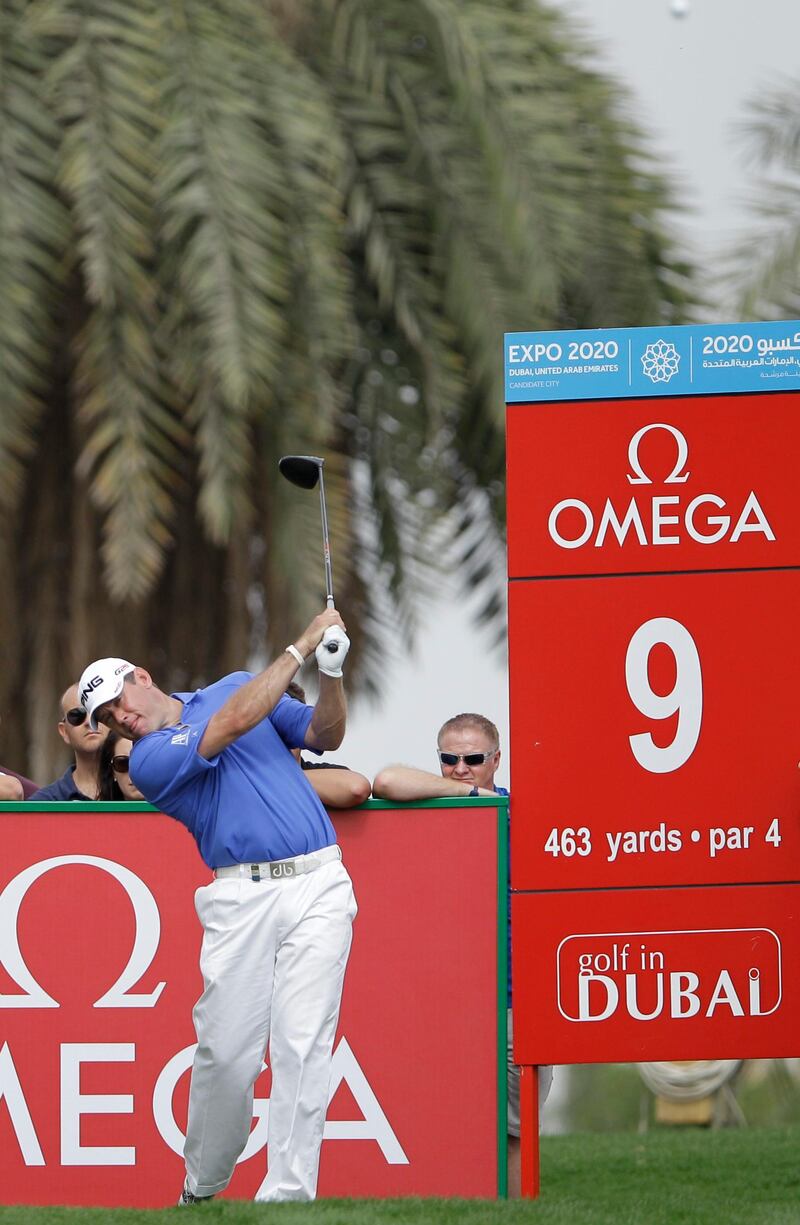 England's Lee Westwood plays a ball on the 9th hole during the second round of the Dubai Desert Classic Golf tournament in Dubai, United Arab Emirates, Friday, Feb. 1, 2013. (AP Photo/Kamran Jebreili) *** Local Caption ***  Mideast Emirates Golf Desert Classic.JPEG-081c3.jpg