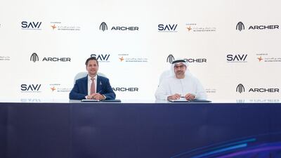 Badr Al-Olama, Adio's director general, and Adam Goldstein, Archer Aviation's founder and chief executive, sign a deal to accelerate the introduction of air taxis in Abu Dhabi. Photo: Abu Dhabi Investment Office