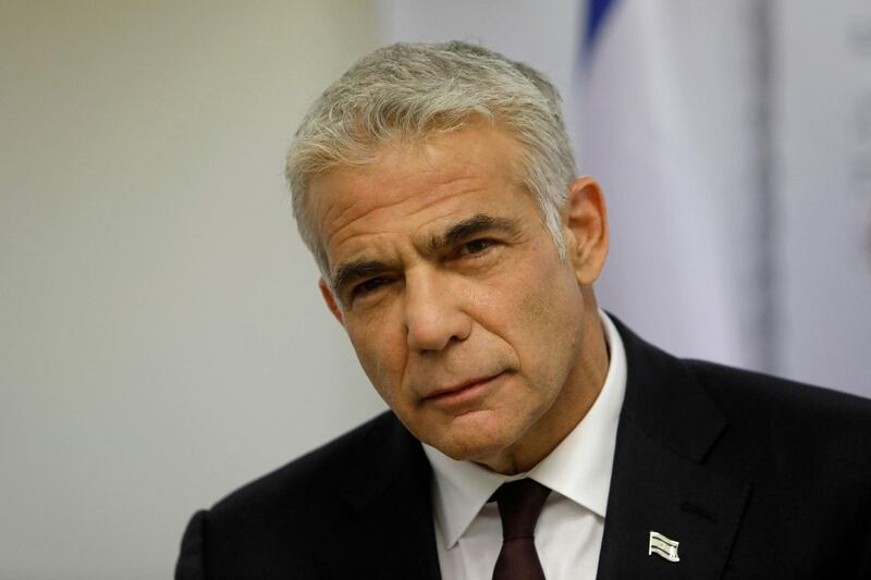 Opposition leader and Chairman of Israel's Yesh Atid party Yair Lapid speaks during a weekly party meeting at the Knesset in Jerusalem. AFP