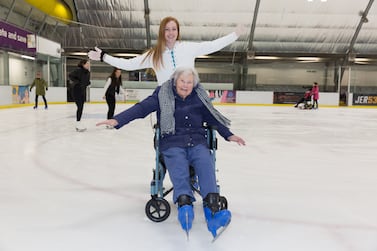 Undated handout photo issued by Care UK of 97-year-old former ice skater Doreen Barber, from Stansted in Essex, back on the ice at Riverside Leisure Centre in Chelmsford, Essex, with Jess Wolohan, lifestyle co-ordinator at her care home. Doreen, who lives at Care UK's Mountfitchet House, on Coltsfield, started skating aged 12 before the Second World War. Her dream of returning to the ice has been fulfilled when she put on her skates for a whizz around the rink in a wheelchair, before receiving a video message from former Olympians Torvill and Dean. Issue date: Monday February 13, 2023.