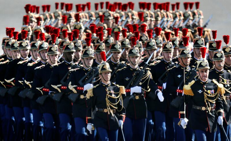 Members of the French Republican Guard march as they arrive for the traditional Bastille day military parade on the Champs-Elysees in Paris, France, July 14, 2017. REUTERS/Yves Herman