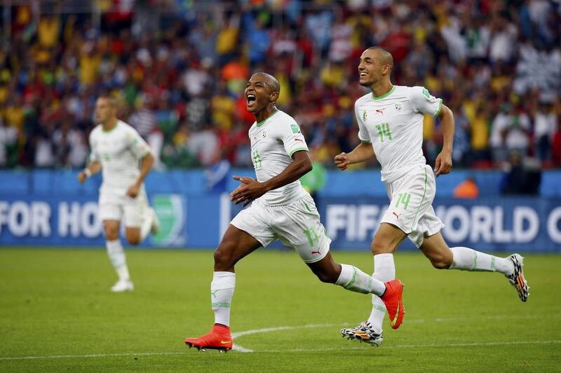 Algeria's Yacine Brahimi, centre, celebrates a goal against South Korea at the 2014 World Cup in Brazil. Damir Sagolj / Reuters / June 22, 2014