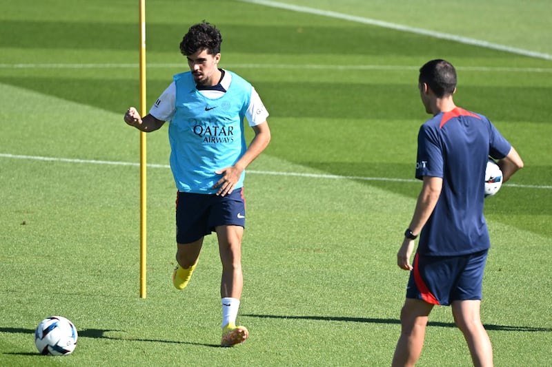 Paris Saint-Germain's Portuguese midfielder Vitinha controls the ball. AFP