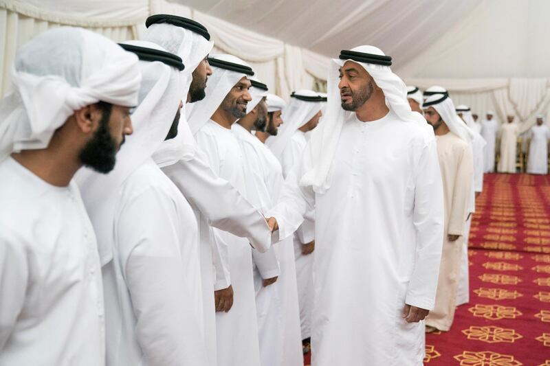 SHAWAMEKH, ABU DHABI, UNITED ARAB EMIRATES - September 15, 2019: HH Sheikh Mohamed bin Zayed Al Nahyan, Crown Prince of Abu Dhabi and Deputy Supreme Commander of the UAE Armed Forces (R), offers condolences for martyr Warrant Officer Zayed Musllam Suhail Al Amri.

( Hamad Al Kaabi / Ministry of Presidential Affairs )​
---