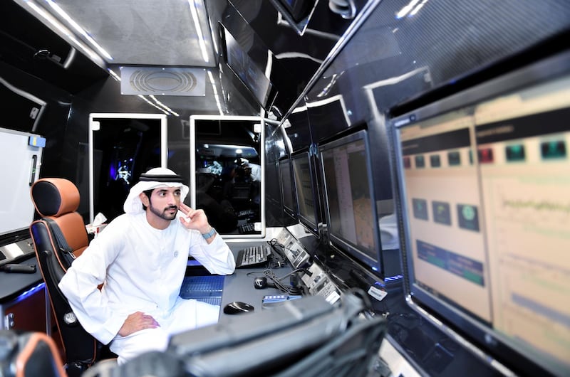 Dubai Crown Prince Hamdan bin Mohammed inspects RTA Dubai's autonomous mobility and AI projects during a visit to Metro Depot at Al Rashidiya. Dubai Media Office / Wam