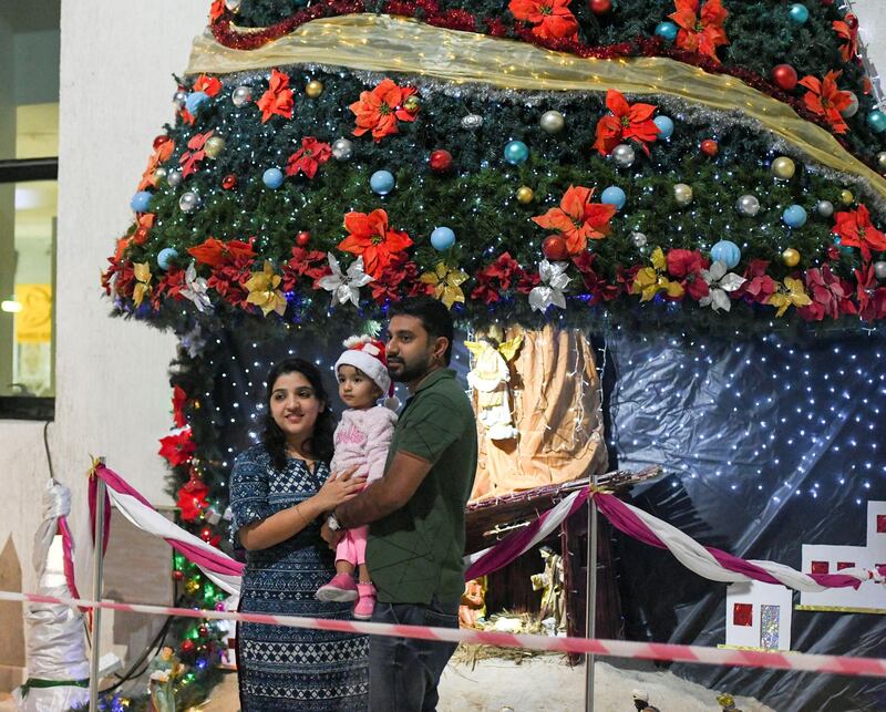 Abu Dhabi, United Arab Emirates - Families take pictures outside St. PaulÕs Catholic Church in Mussafah. Khushnum Bhandari for The National