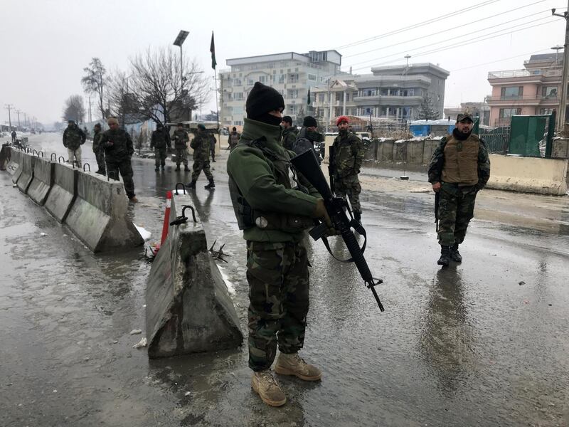 Afghan security forces keep watch at the site of a blast in Kabul, Afghanistan, February 11, 2020. REUTERS/Omar Sobhani