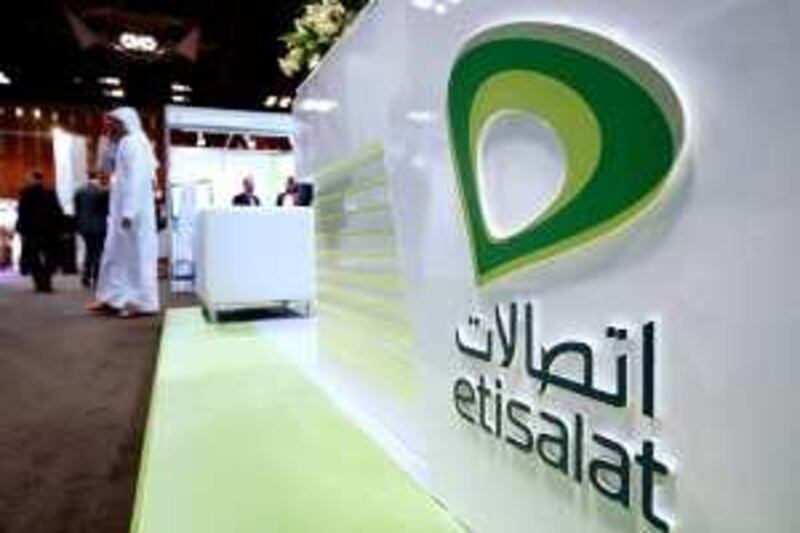DUBAI, UNITED ARAB EMIRATES – Dec 7: Etisalat stand in exhibition area of GSM 3G Middle East Telco World Summit held at Dubai International Convention and Exhibition Centre in Dubai. (Pawan Singh / The National) For Business. Story by David George.
 *** Local Caption ***  PS0712- GSM SUMMIT029.jpg