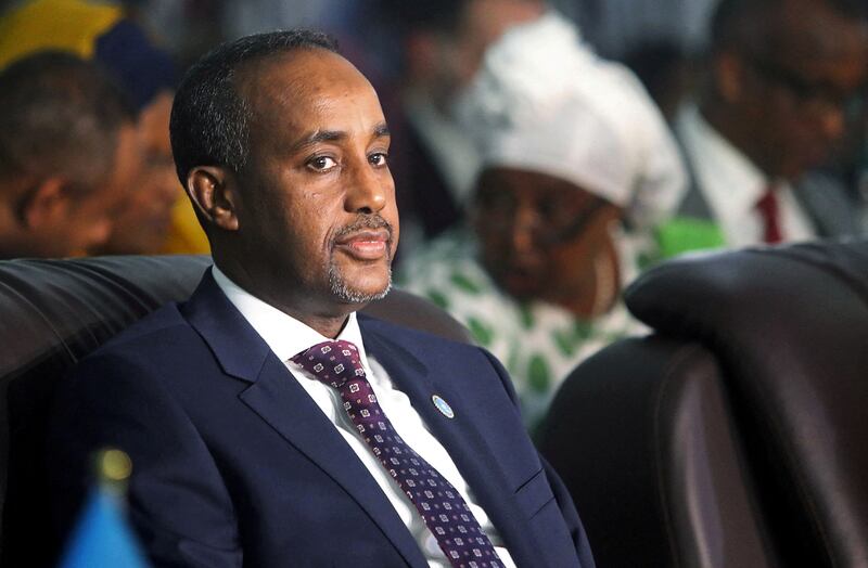 FILE PHOTO: FILE PHOTO: Somalia's Prime Minister Mohamed Hussein Roble confirmed the plane had been carrying aid to the government and pledged to return the money 'as soon as possible'. Reuters