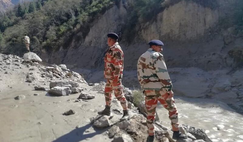 Indo-Tibetan Border Police (ITBP) personnel arrive for rescue work after a section of Nanda Devi glacier broke off in the Tapovan area of the northern state of Uttarakhand. AP