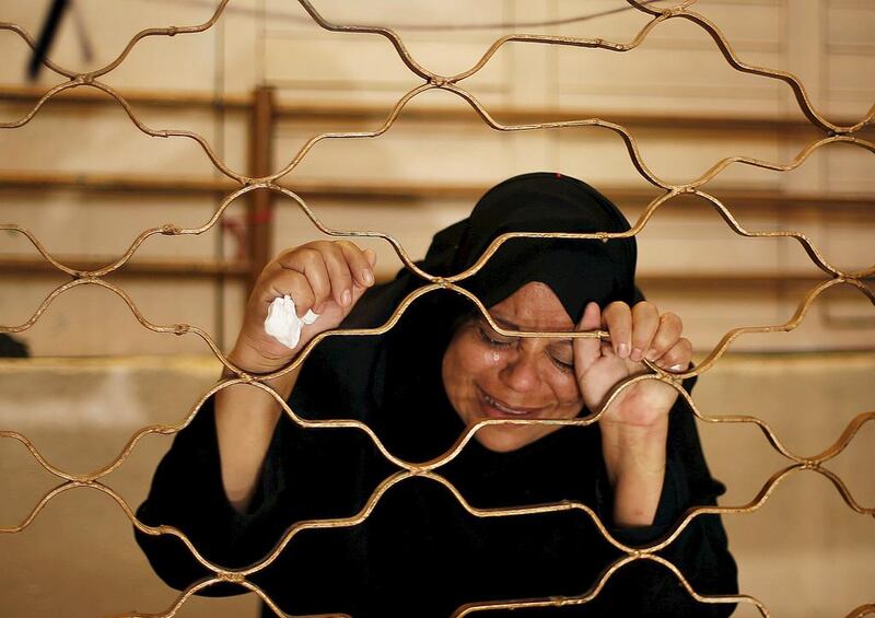 A relative of Palestinian Mahmoud Hmead, 22, who was killed by Israeli troops in Friday's clashes, mourns during his funeral in Gaza on October 17, 2015. Mohammed Salem/Reuters