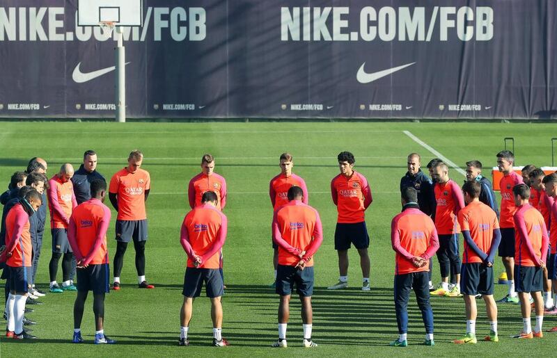 FC Barcelona players and team members observe a minute of silence for the victims of the plane crash near Medellin during their team’s training session at Joan Gamper Sports City in Sant Joan Despi, near Barcelona. Andreu Dalmau / EPA