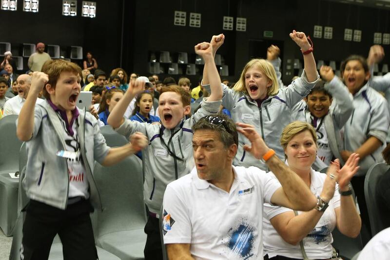 Students from Repton School in Dubai cheer as their team, Project Speed, was called as the winner of the F1 In Schools National Final winners. Delores Johnson / The National 