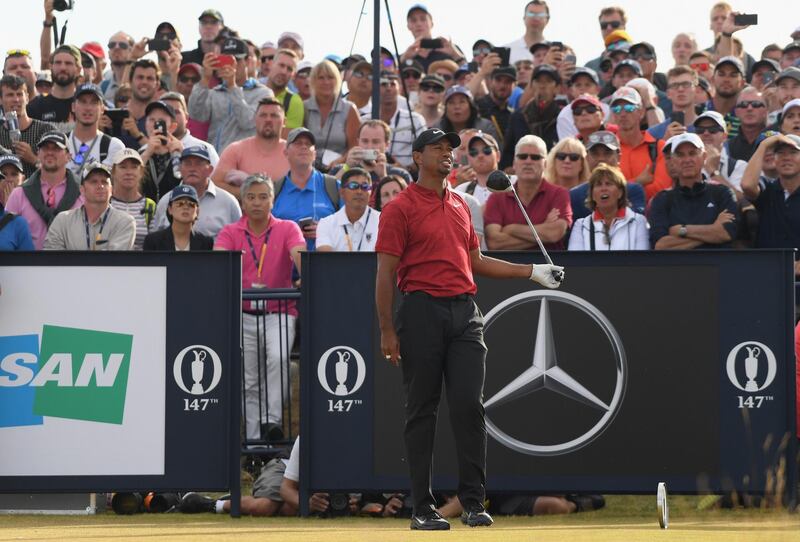CARNOUSTIE, SCOTLAND - JULY 22:  Tiger Woods of the United States reacts to his tee shot on 18th hole after being disturbed by a fan during the final round of the 147th Open Championship at Carnoustie Golf Club on July 22, 2018 in Carnoustie, Scotland.  (Photo by Harry How/Getty Images)