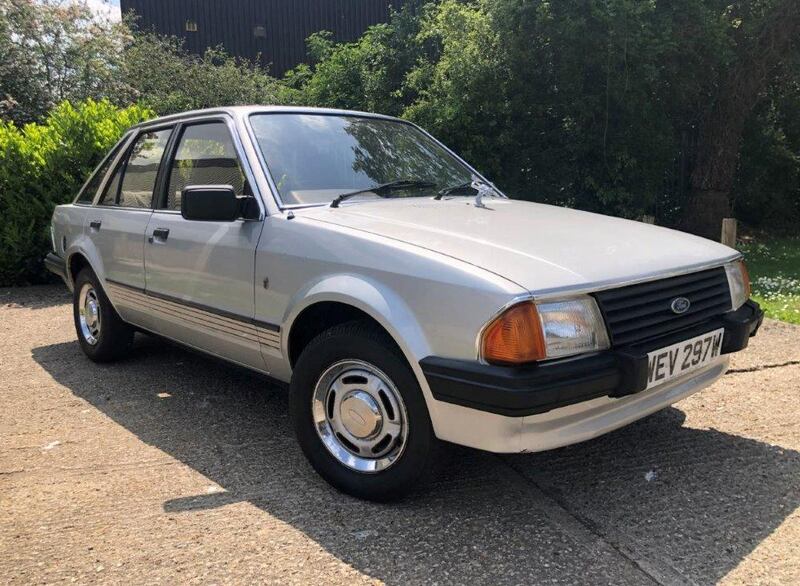 The Ford Escort was sold with 83,000 miles on the clock. AFP