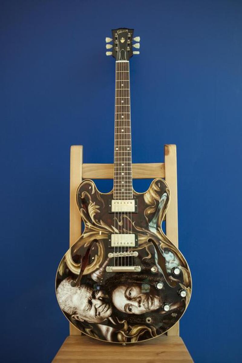 An ES Gibson guitar decorated by artist Jade Urmenita from the Philippines titled What Would I Do?  Antonie Robertson / The National