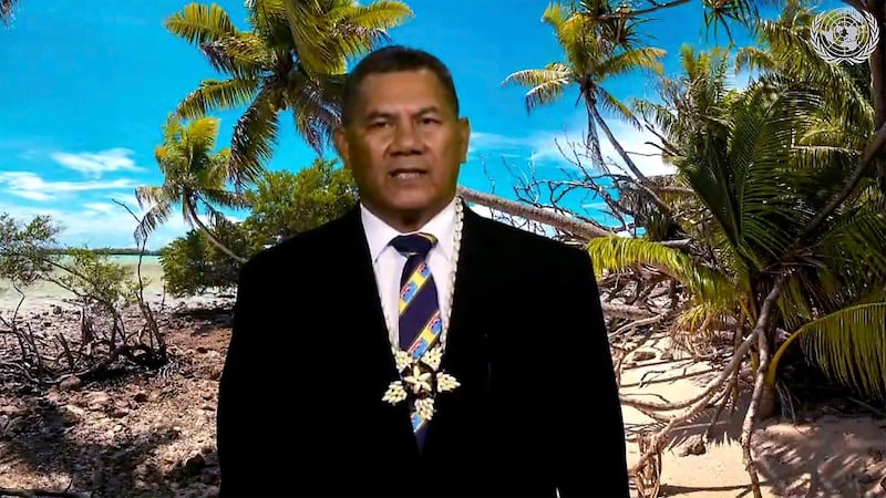 Kausea Natano, Prime Minister of Tuvalu, gave the global audience a picture of its tropical shore. UNTV via AP