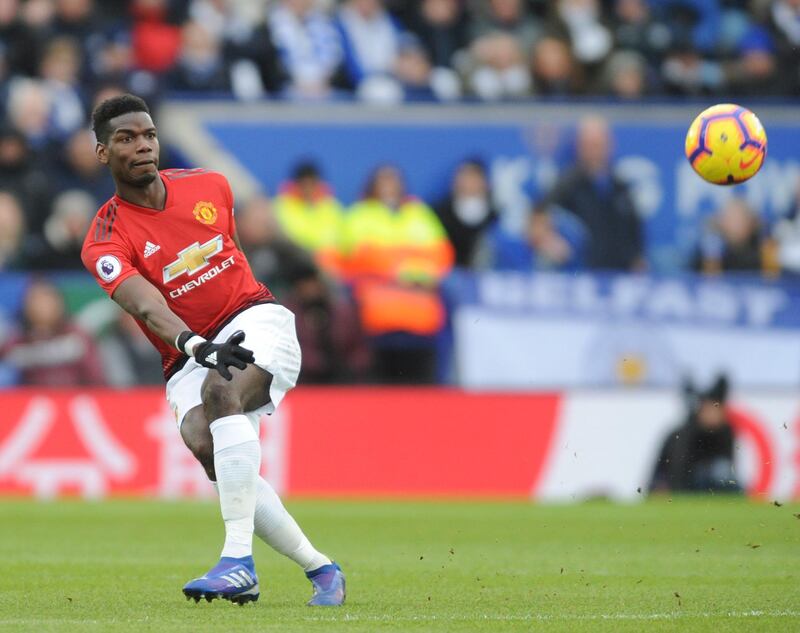 Manchester United's Paul Pogba plays a ball forward. AP Photo