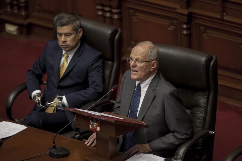 Pedro Pablo Kuczynski, Peru's president, right, testifies before the National Congress in Lima, Peru, on Thursday, Dec. 21, 2017. Kuczynski told Peru's Congress Thursday that allegations linking him with a continent-wide bribery scandal are false, as he fights to save his 17-month presidency from today's impeachment vote. Photographer: Guillermo Gutierrez/Bloomberg