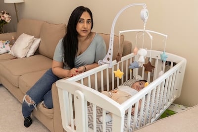 Mandy Sanger, a resident of the Golden Mile on The Palm, with her four month old baby boy Devan who is constantly kept awake by super cars racing on the Golden Mile road on The Palm on June 3rd, 2021. 
Antonie Robertson / The National.
Reporter: Nick Webster for National