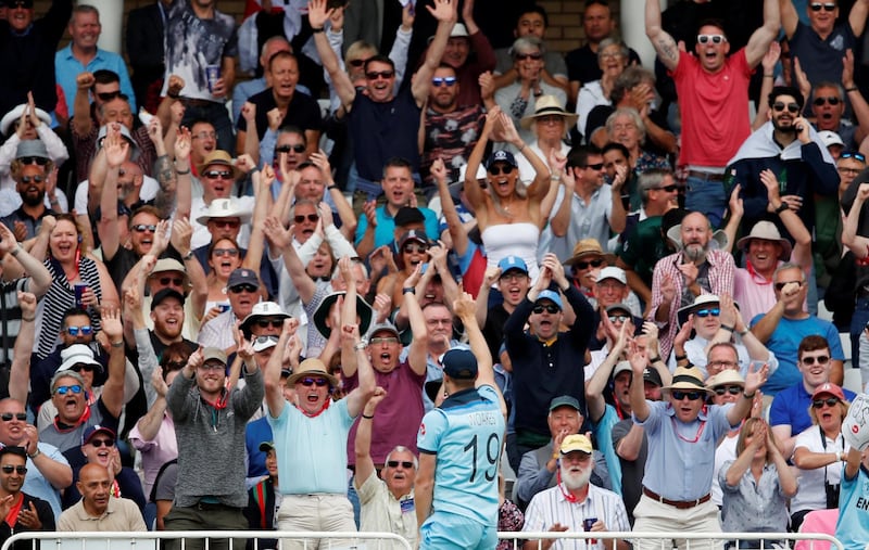 Cricket - ICC Cricket World Cup - England v Pakistan - Trent Bridge, Nottingham, Britain - June 3, 2019   England's Chris Woakes celebrates with fans after catching out Pakistan's Imam-ul-Haq   Action Images via Reuters/Andrew Boyers