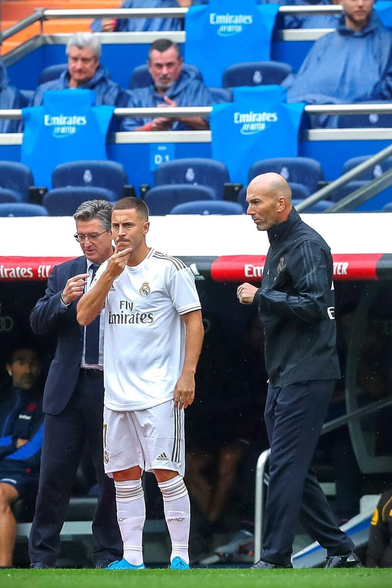 Real Madrid manager Zinedine Zidane prepares to bring on Eden Hazard. EPA