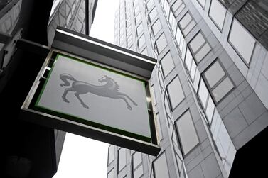 A sign hangs outside a Lloyds Bank branch in London. Reuters