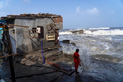 Waves hit the Arabian Sea coast in Mumbai on Tuesday. AP