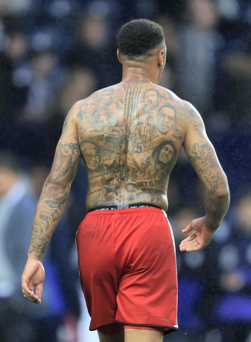 A view of Watford's Andre Gray's tattoos during the Premier League match at The Hawthorns, West Bromwich. (Photo by Mike Egerton/PA Images via Getty Images)