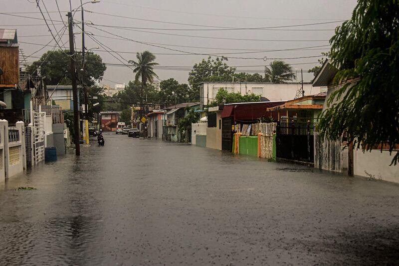 Puerto Rico's power supply has been knocked out after Hurricane Fiona made landfall, causing 'catastrophic' flooding and landslides. AFP