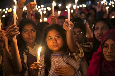 DHAKA, BANGLADESH - MARCH 08: Women attend a candlelight vigil in the early hours of March 8, 2020 in Dhaka, Bangladesh. International Women's Day is observed on March 8 every year, celebrating the achievements of women around the world. (Photo by Allison Joyce/Getty Images) *** BESTPIX ***
