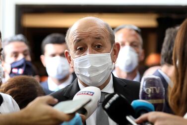 French Foreign Minister Jean-Yves Le Drian talks to reporters at a school in Mechref on July 24, 2020, at the end of a two-day visit to Lebanon. Reuters