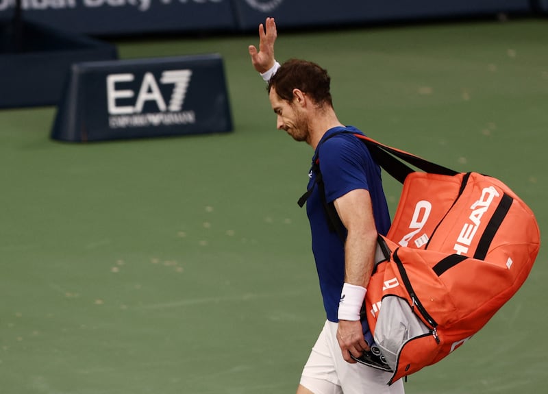 Britain's Andy Murray waves to the crowd after losing his round of 16 match against France's Ugo Humbert 6-2, 6-4 at the Dubai Duty Free Tennis Championships on February 28, 2024. Reuters