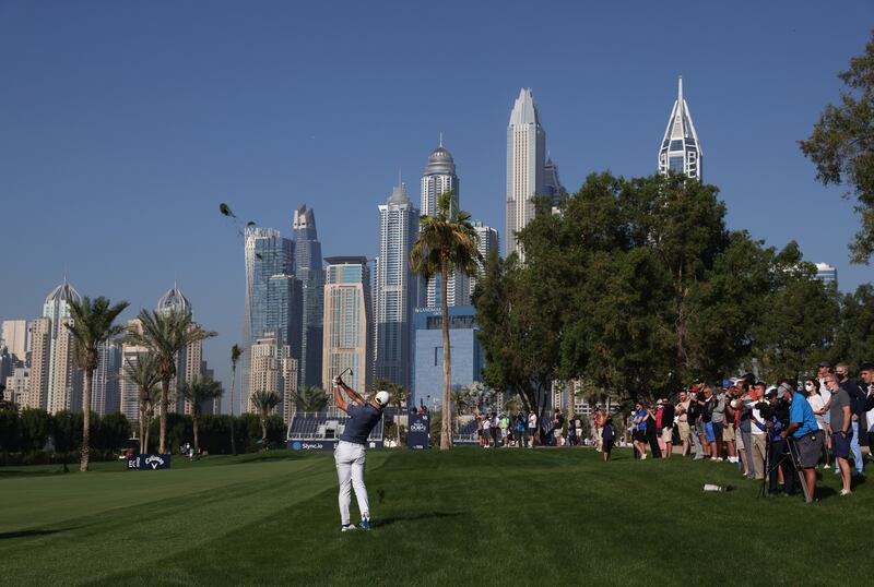 Rory McIlroy plays his approach shot on the 16th hole. Getty 