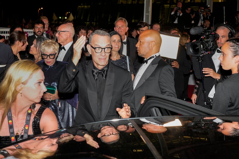 Tom Hanks is seen departing the premiere of the film 'Elvis' at the 75th international film festival. AP