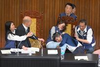 Today's best photos: From a brawl in Taiwan's parliament to a dye house in Cairo