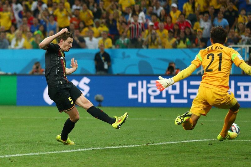 Jan Vertonghen of Belgium shoots and scores Belgium's goal to put them up 1-0 in their win over South Korea at the 2014 World Cup on Thursday. Clive Brunskill / Getty Images