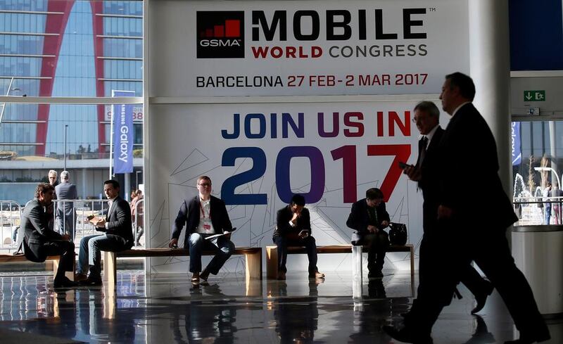 Participants arrive early for the Mobile World Congress in Barcelona, Spain. Albert Gea / Reuters