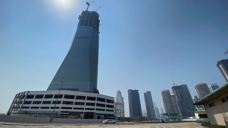 It took teams two days per floor to construct the outer layer of the building, which comprises more than 8,500 glass panels. Photo: Antonie Robertson / The National