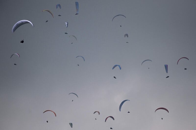 Participants take part in the paragliding men's team cross country event during the 2018 Asian Games in Jakarta, Indonesia. Fred Dufour/AFP