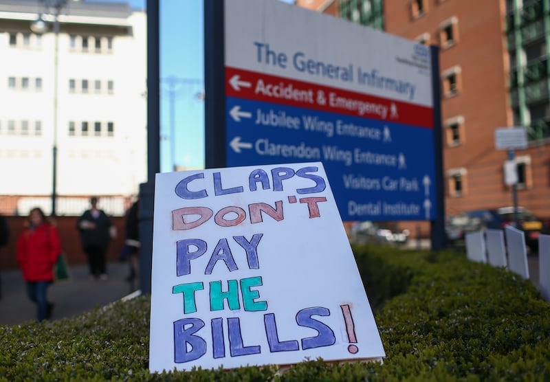 Striking doctors put up a sign outside Leeds General Infirmary. EPA
