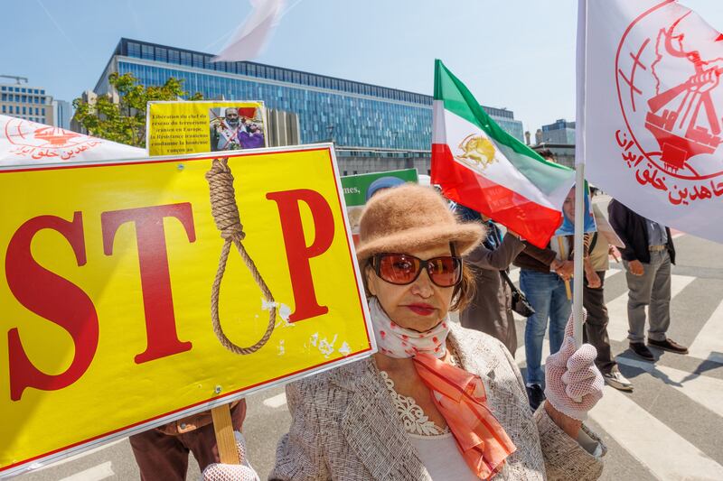 Iranians in Brussels protest against the crackdown in front of the Commissariat for Refugees HQ. EPA